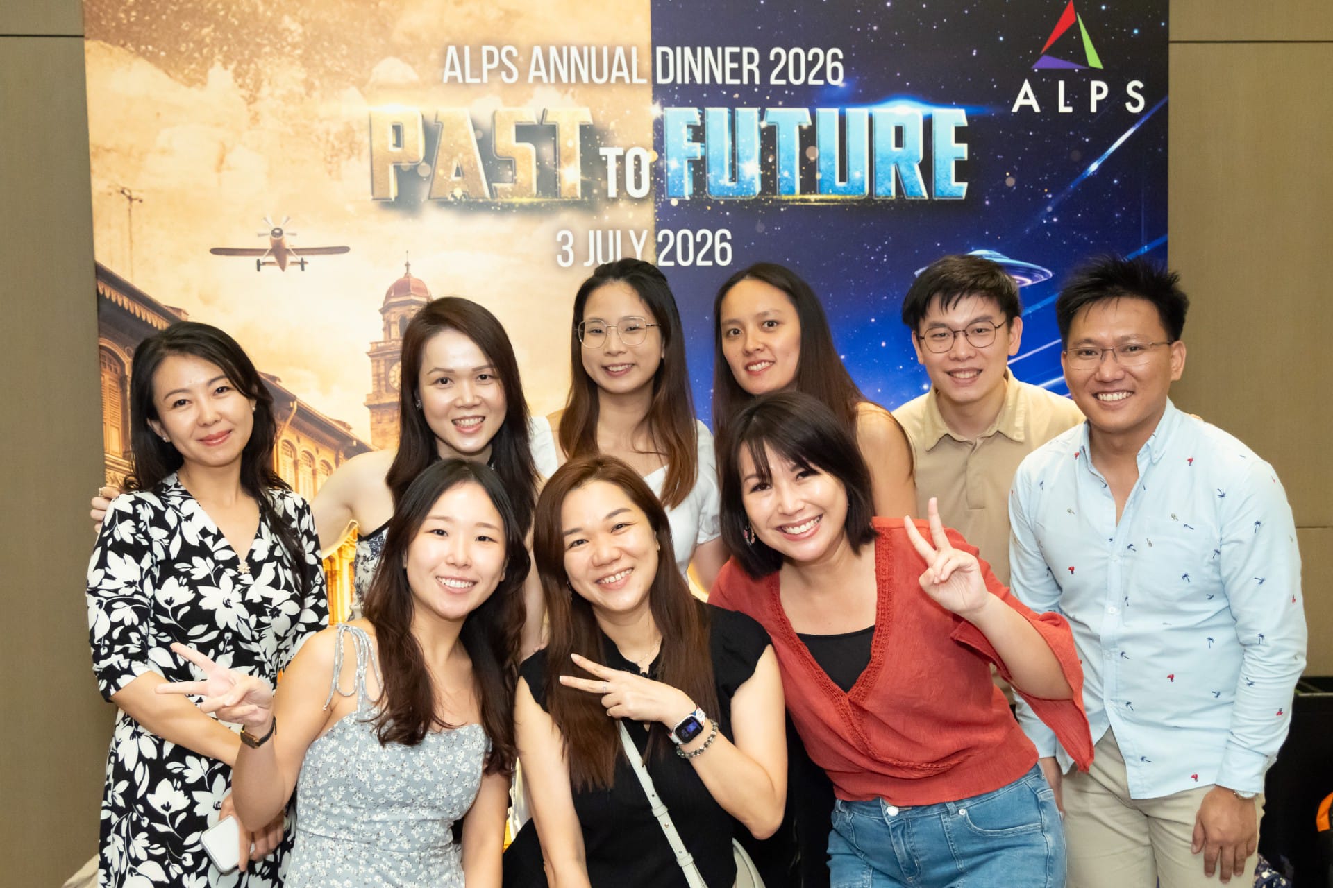 Photo of 9 ALPS staff taken at ALPS Anniversary Dinner